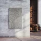Infrarotheizung Natursteinheizung Granit feinschliff des Herstellers eurotherm an Wand montiert in Ambiente.