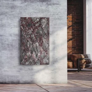 Natursteinheizung Salome als dramatischer Wandakzent in einem Loft mit Sichtbeton und Ziegelwand – Luxuswärme